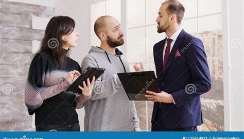 Real estate agent holding a shield protecting documents