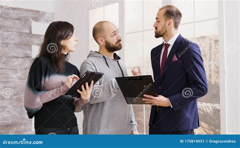 Real estate agent holding a shield protecting documents