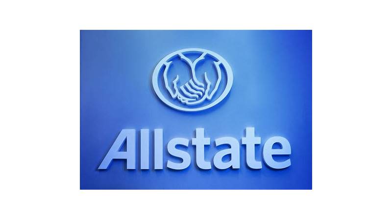 Allstate insurance agent discussing policy with a client in a bright office setting